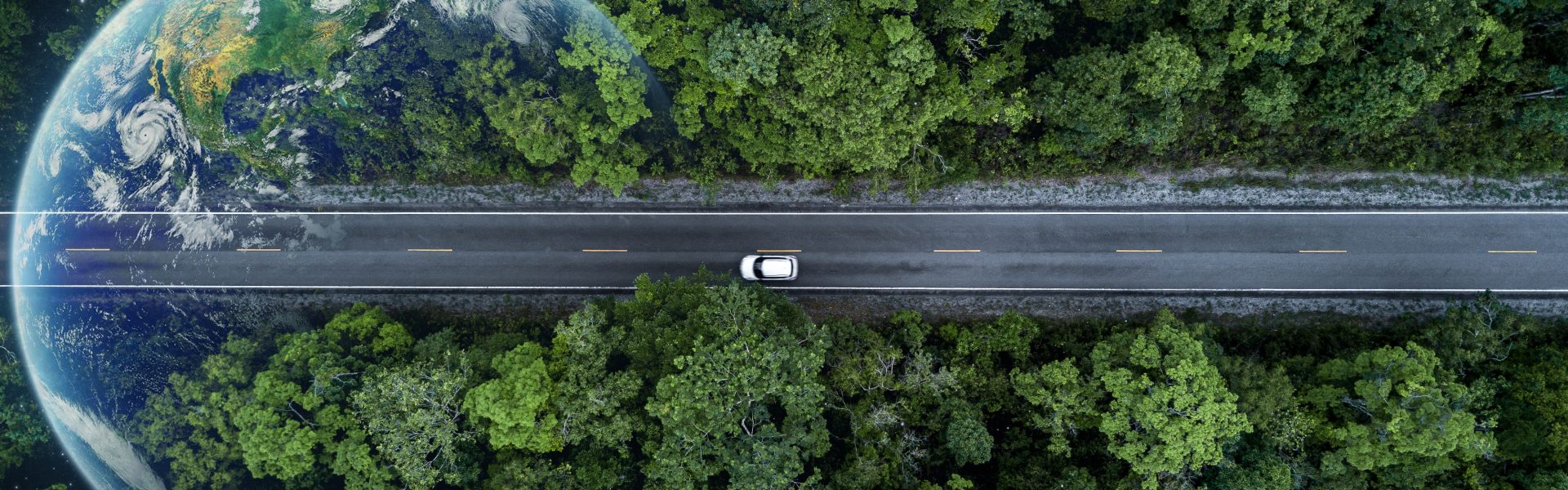 eco,car,on,forest,road,with,earth,planet,going,through