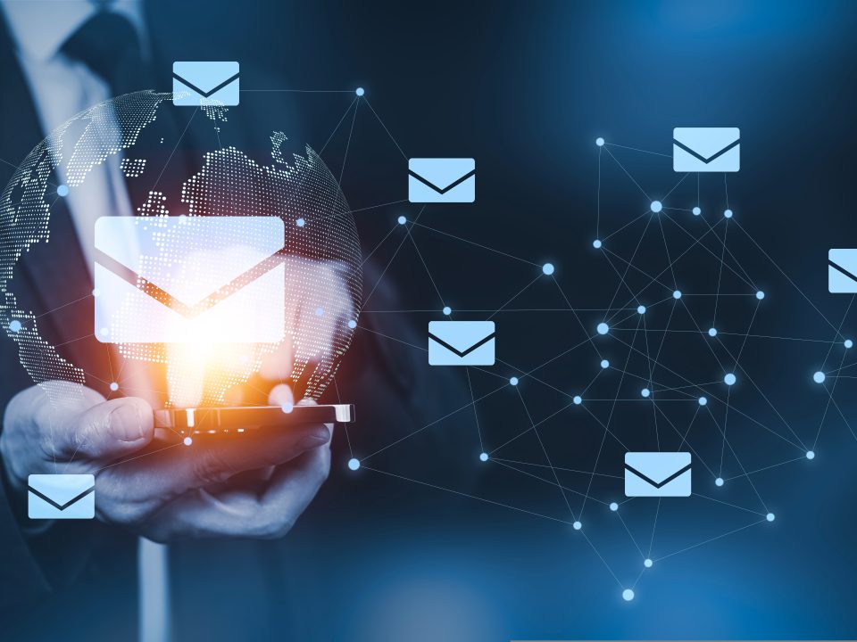 businessman,hand,pressing,smartphone,for,sending,the,e mail,from,the