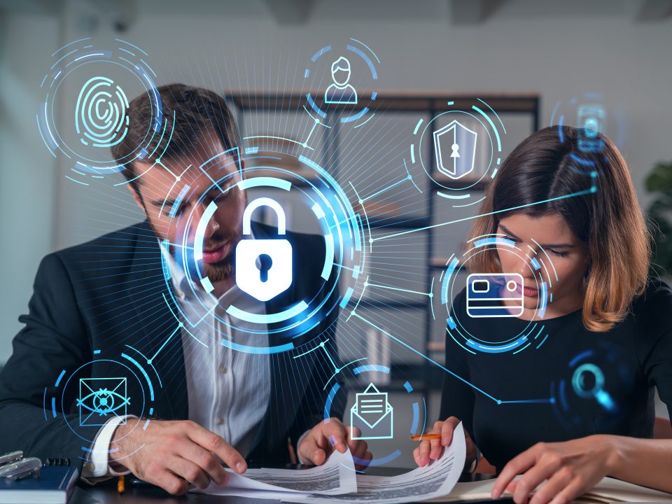 businesspeople,in,formal,wear,taking,notes,signing,contract,at,office