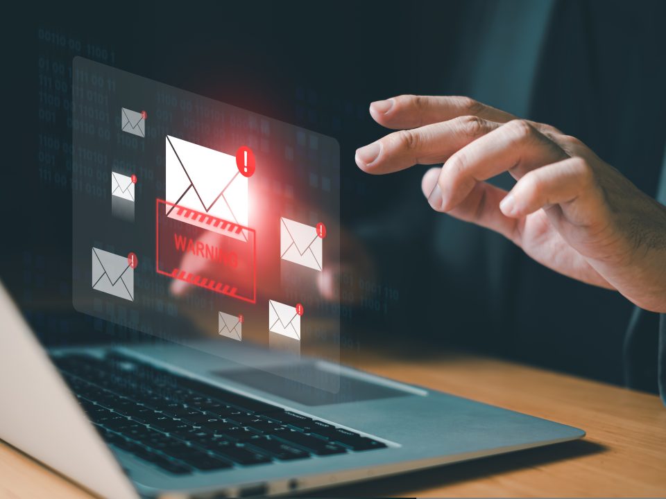 business,man,using,smartphone,and,computer,that,show,warning,sign