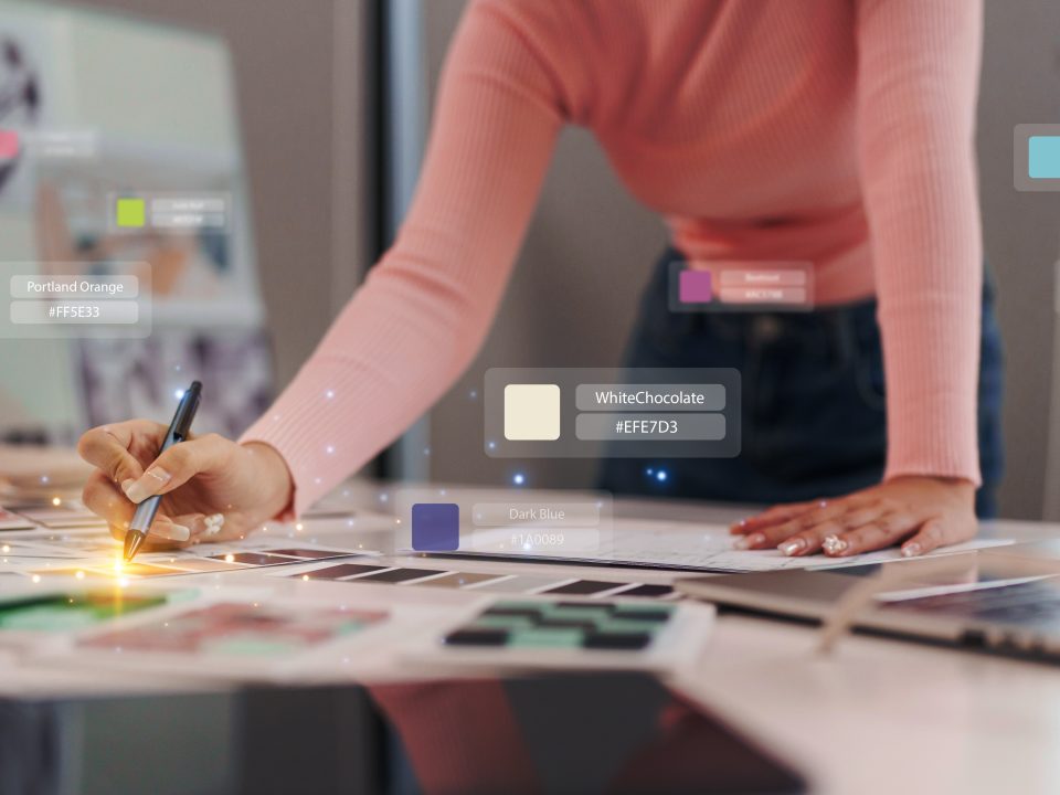 asian,designer,focused,on,color,selection,working,on,design,project