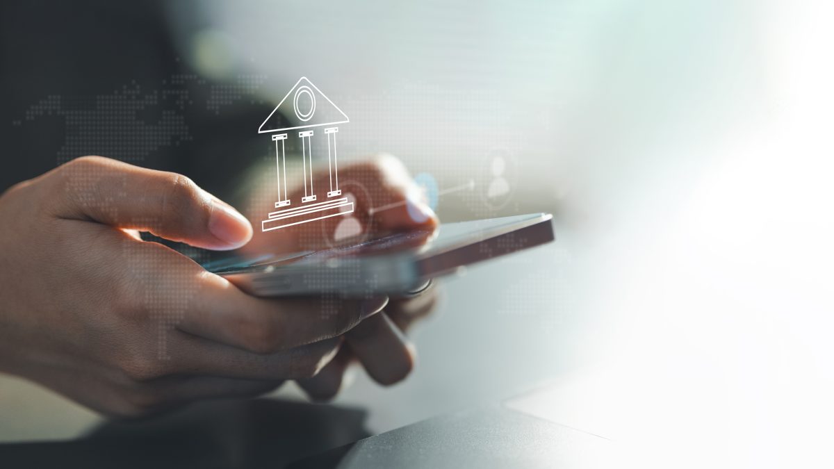 close up,of,hands,using,a,smartphone,with,a,digital,banking