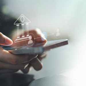 close up,of,hands,using,a,smartphone,with,a,digital,banking